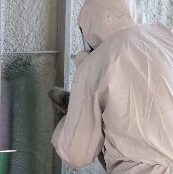 Commercial spay foam being applied in milwaukee
